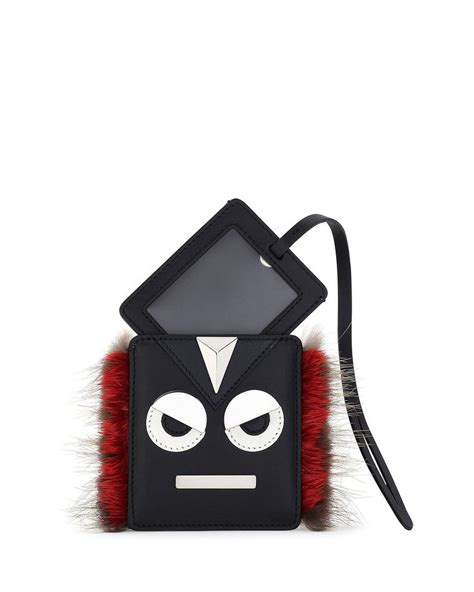 fendi monster black leather luggage charm tag|Add A Little Monster To Your Bag With a Fendi Fur Charm.